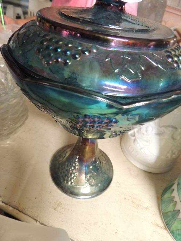 lot 359 image: Blue CARNIVAL glass fruit stand,  1776 white American eagle mug and gold hand panted canister