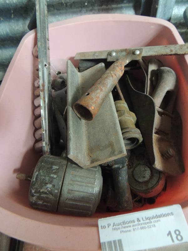 lot 18 image: wrenches, sockets, clamps all in a pink tub