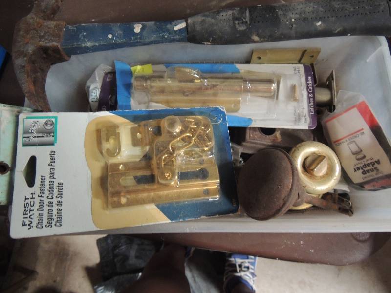 lot 21 image: Door knobs some with locks, hammer, chair facet for door and more