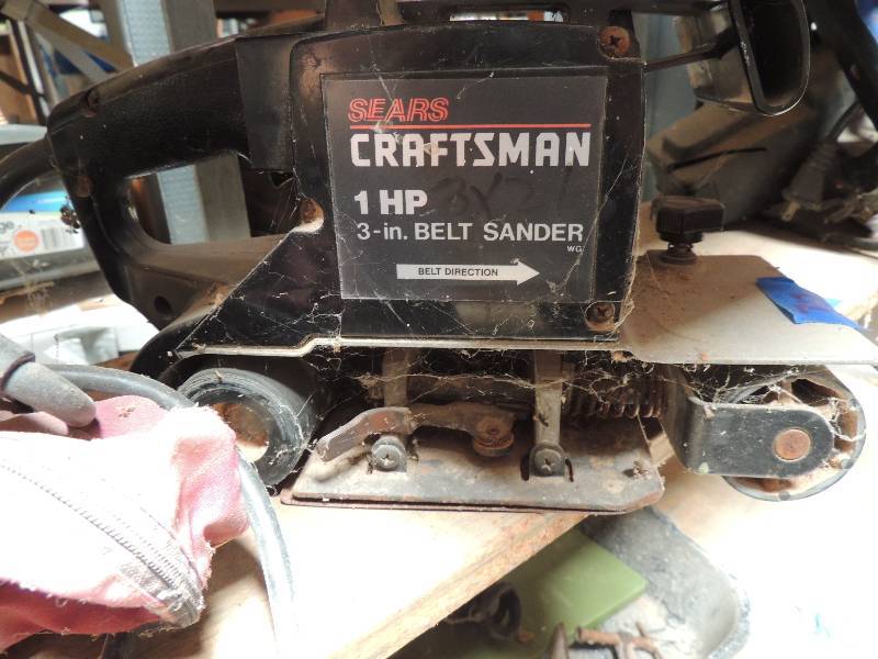 lot 713 image: Craftsman 3 inch BELT Sander.   Makita Palm sander 4 inch