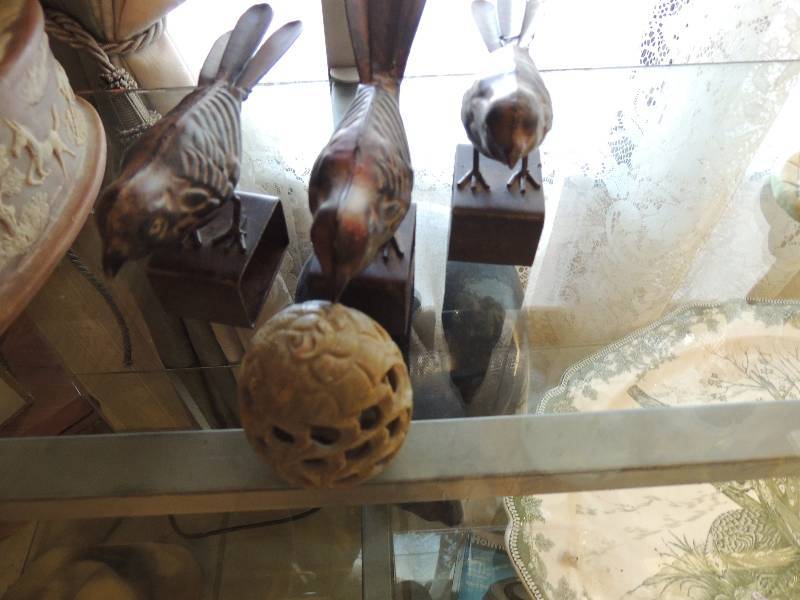 lot 15 image: 3 metal birds on stand green egg base with owl inside