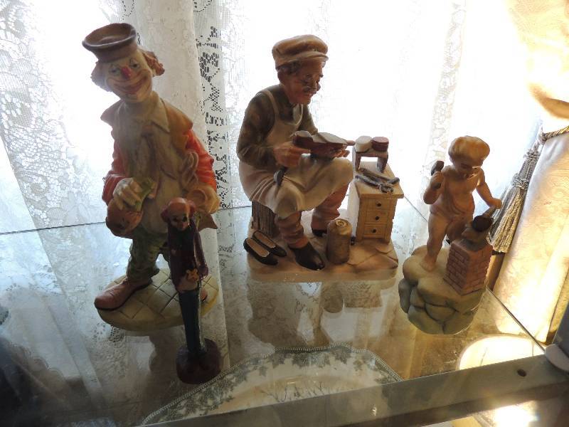 lot 16 image: 2 Albert clown statues Andrea hand painted lady and Orleans man statue show shine shop