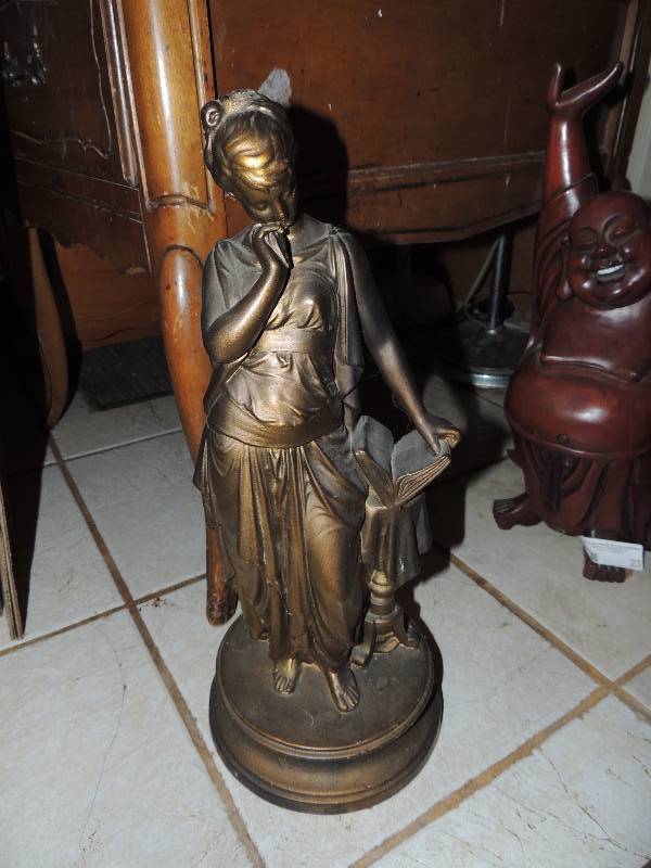 lot 22 image: 17 12 tall bronze statue of woman reading