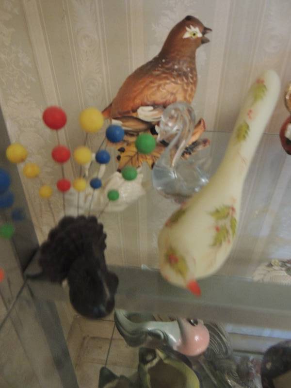 lot 33 image: Lot of figurines- swans, cardinals, turkeys etc.