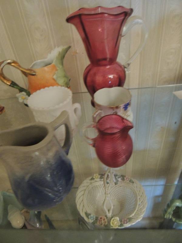 lot 36 image: Salt glazed pitcher, 2 small pitchers, 1 - large red pitcher, 1 basket, 1 milk glass vase