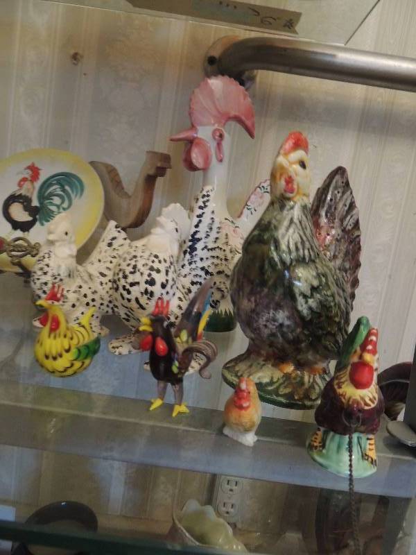 lot 45 image: Large lot of roosters- S&P shakers and plate with stand