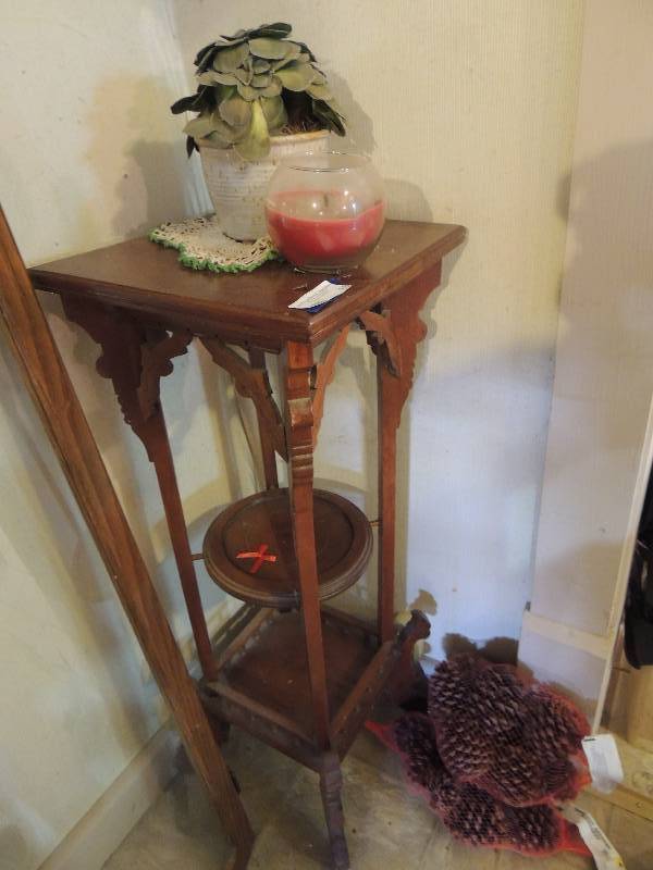 lot 85 image: Brown shelf with 2 tier shelf  with candle and flower pot