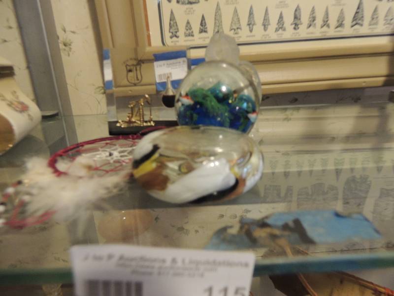 lot 115 image: Blown glass and crest petroleum shadow box