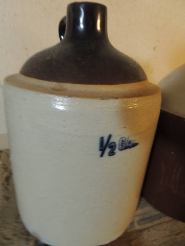 lot 165 image: Homestead jug and12 gallon jug