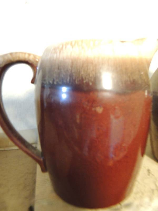 lot 166 image: 2 PITCHERS mirror brown by Hull #7071, Brown ceramic