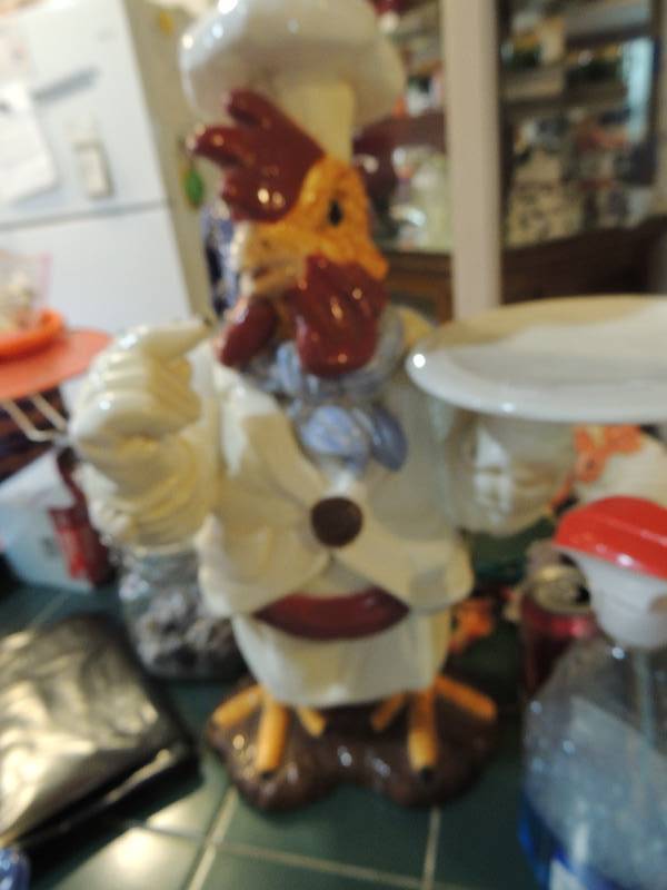 lot 199 image: 18 Chef rooster holding a plate