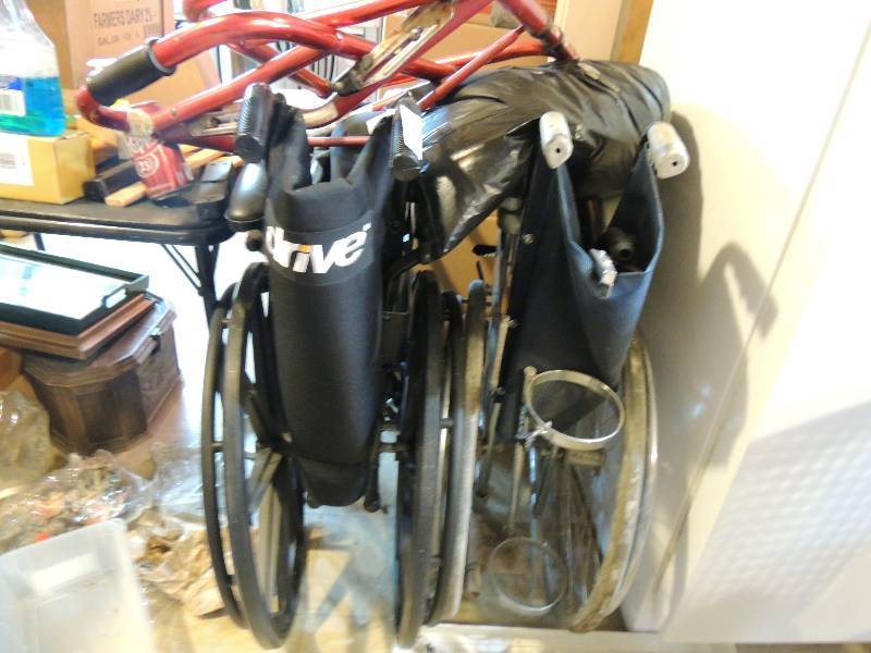 lot 203 image: 2 wheelchairs and a red walker