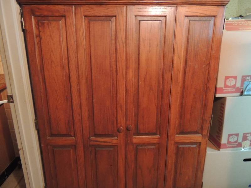 lot 212 image: Large wooden hutch 4 cabinets inside double doors contents not included