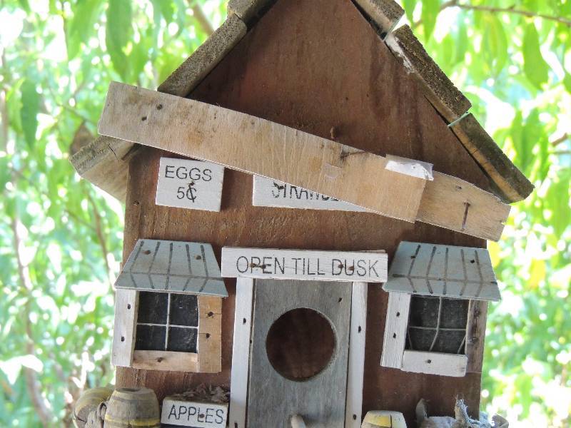 lot 301 image: 2 bird house and one bird store bird house