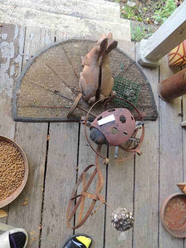 lot 304 image: Vintage bike planter and metal ladybug
