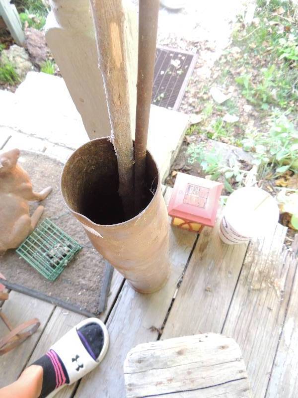 lot 305 image: Metal MILITARY SHELL CASING With utensils
