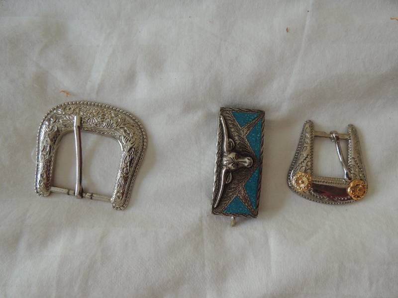 lot 362 image: 3 belt buckles 1 with gold colors rosettes, one new and one of Mexican silver
