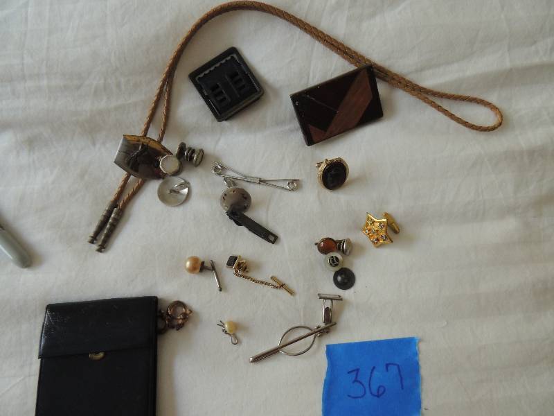 lot 367 image: Lot- Bolo tie, tie bar pins and Prince Gardner photo wallet and more