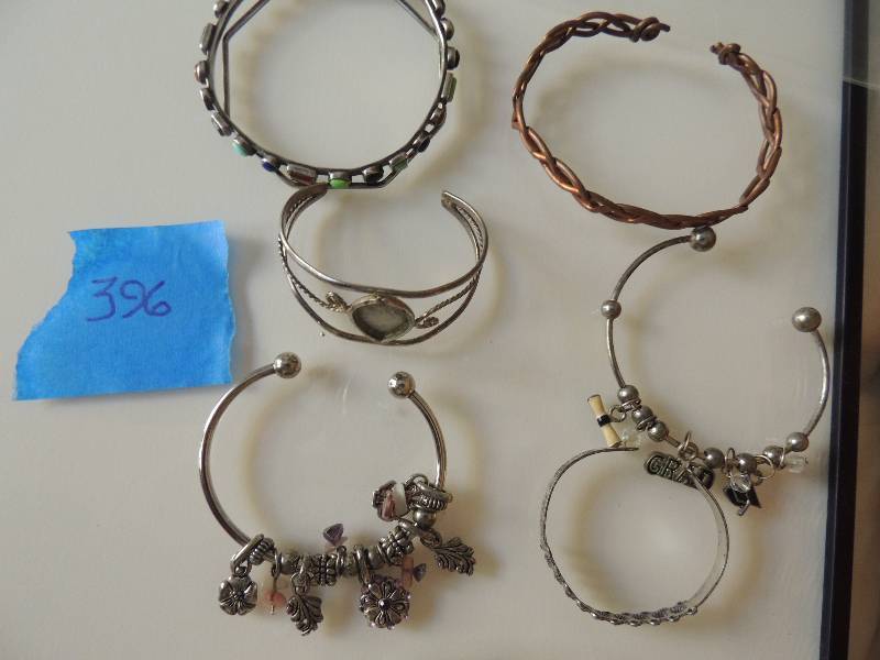 lot 396 image: Bracelets 7 pieces silver and copper