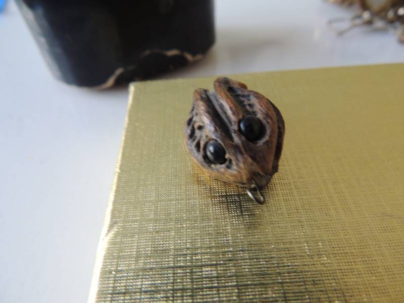 lot 401 image: Oddity Chinese carved nut pod charm in  SMALL JEWELRY Box. Great gift for mother-in-law