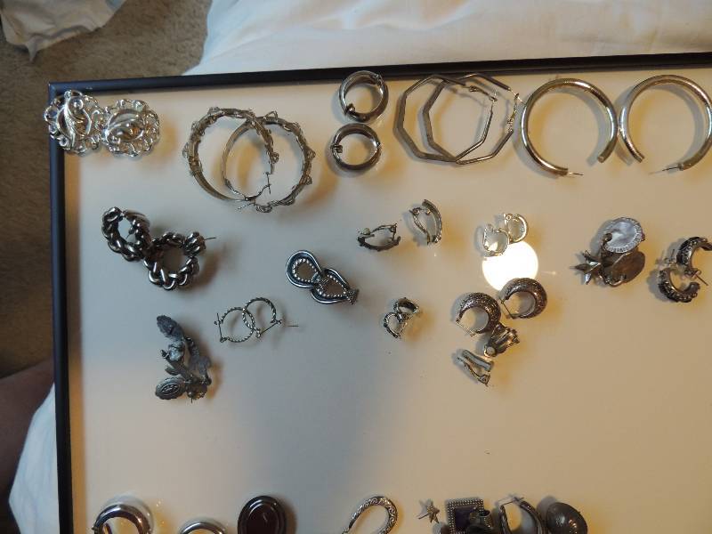 lot 407 image: 16 pair of silver tone clip on and pierced earrings plus