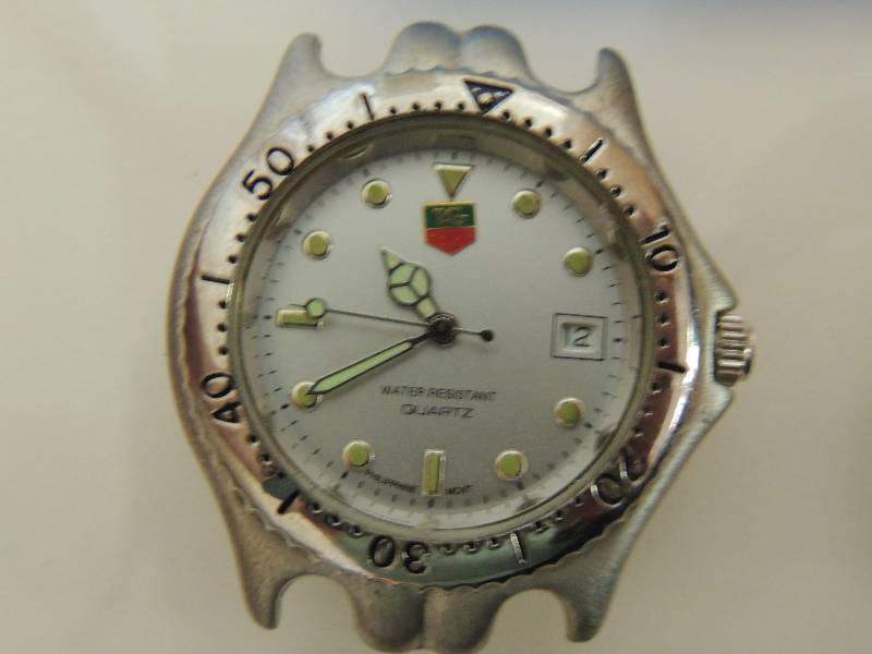 lot 411 image: TAG HEUER WATCH - 974, NO BAND    Waltham diamond quartz, no stem no bands