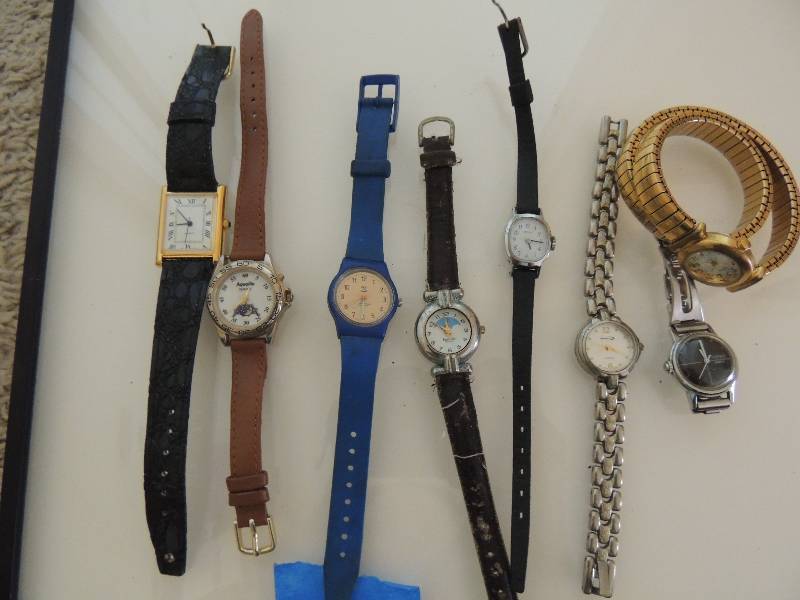 lot 419 image: Watches x 8 Aqua lite, Etenith and more one is wrist wrap unkown working condition