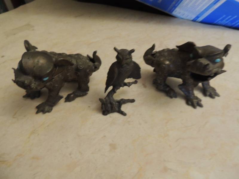 lot 12 image: Metal figurines of a dragon dog  x 2 and Owl on tree limb