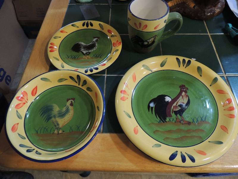 lot 105 image: Set of rooster dishes Provence Rooster Collection by Braun Brothers made in China setting for 4