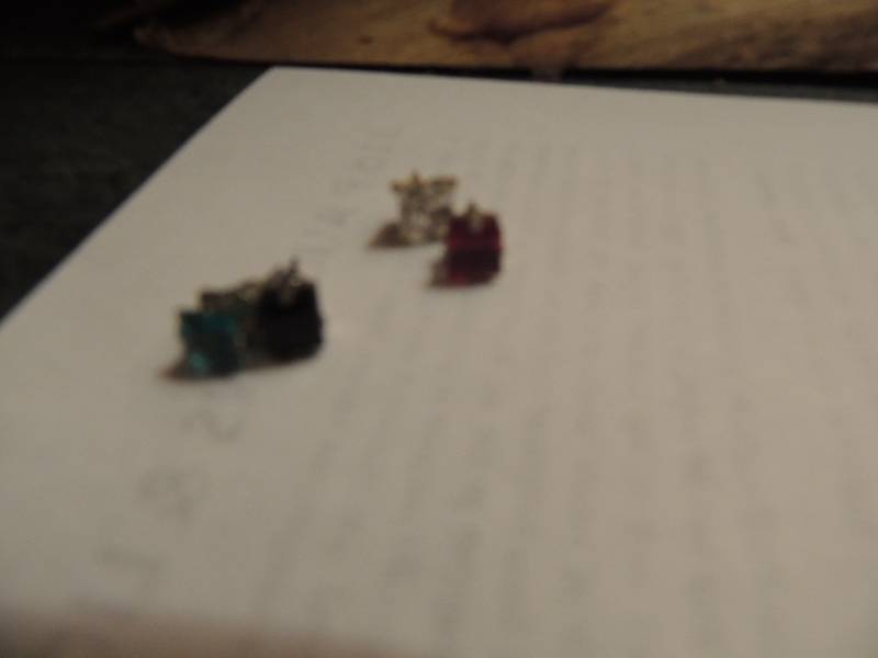 lot 454 image: 10 matched pair of pierced ear studs.Plus 4 extra studs assorted colors.