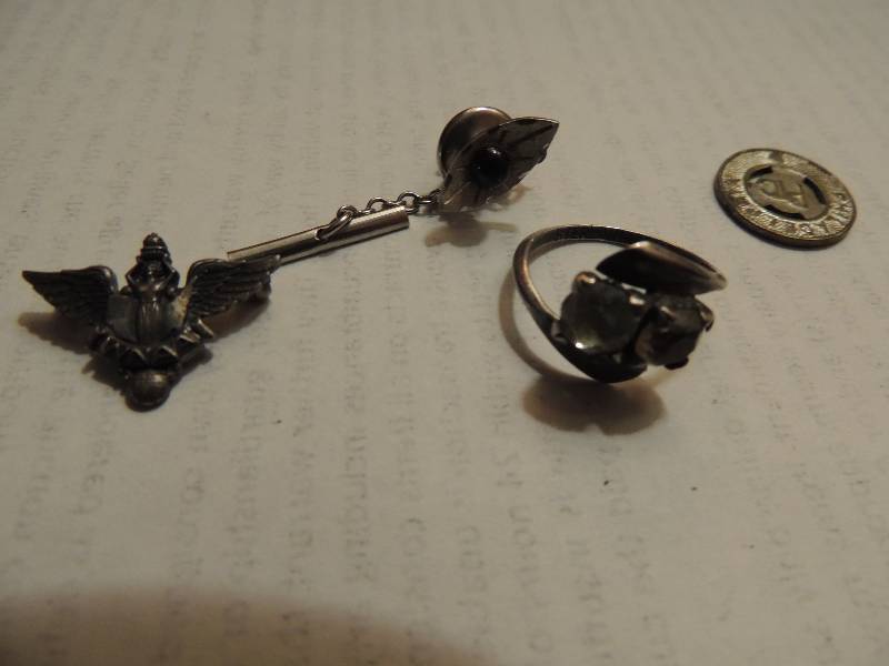 lot 455 image: Tie tac, sterling ring AND WNAA (Womans National Aviation Association) in. Found one like it in Smithsonian museum