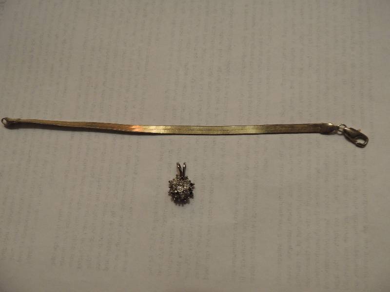 lot 457 image: Gold Herringbone 7 bracelet and necklace drop