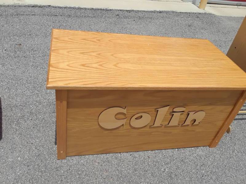 lot 69 image: WOOD TOY BOX NAME CAN BE REMOVED