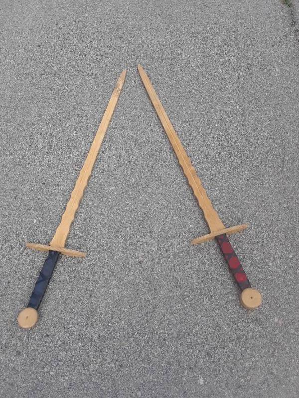 lot 83 image: 2 WOOD KIDS SWORDS