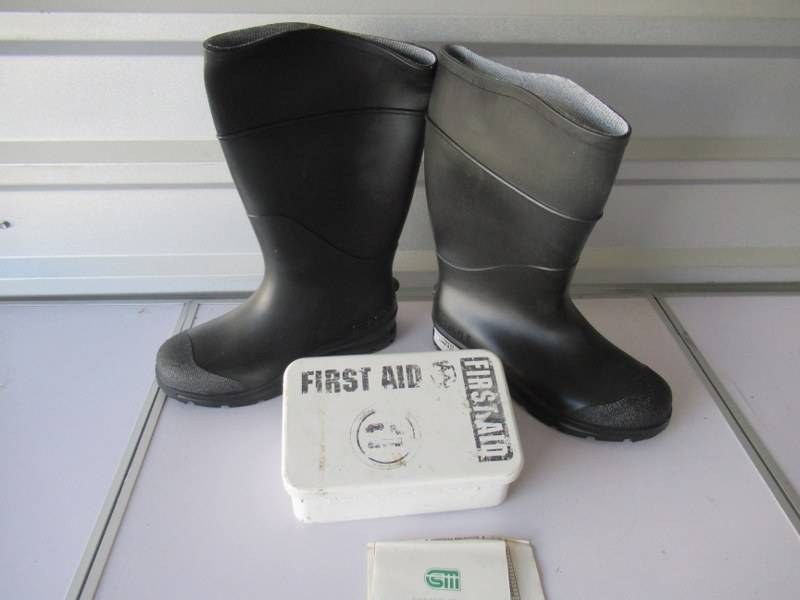 lot 86 image: BOOTS AND FIRST AID KIT