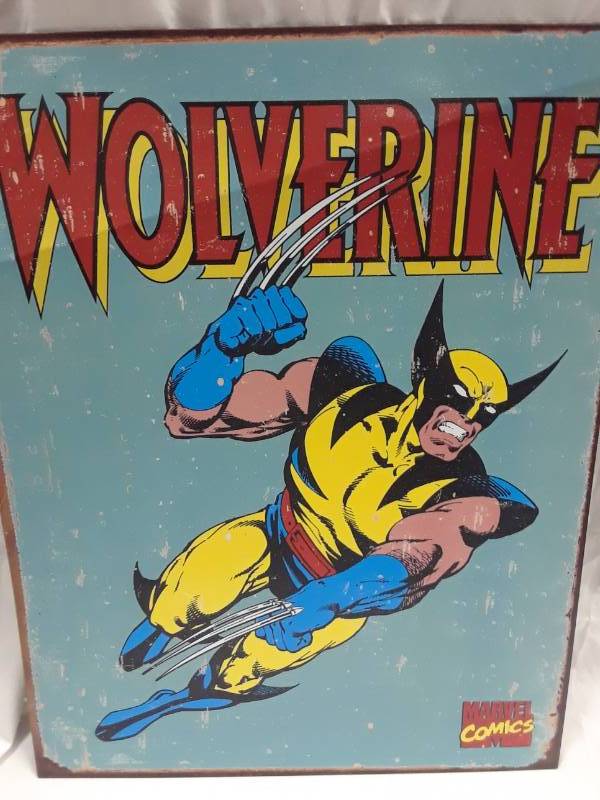 lot 58 image: METAL WOLVERINE SIGN