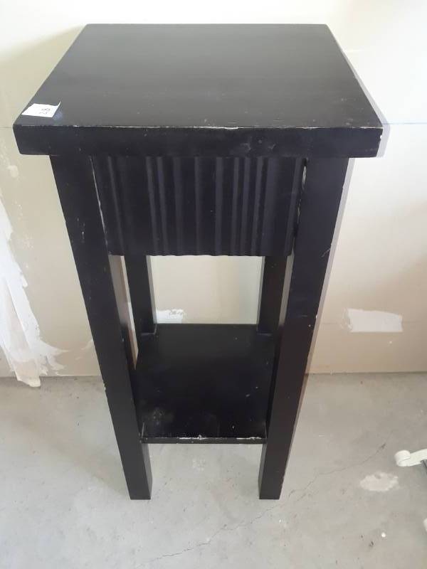 lot 28 image: BLACK PLANT TABLE