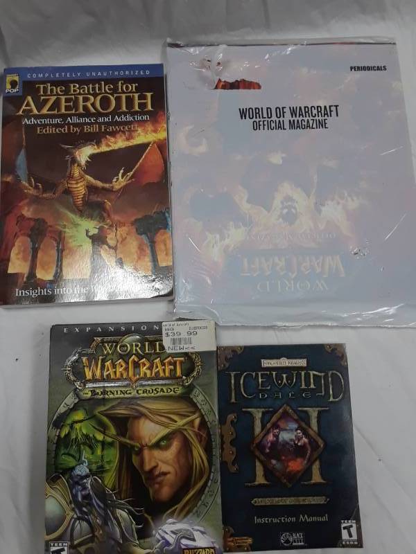 lot 102 image: THE WORLD OF WARCRAFT SET OF GAMES AND MAPS BOOKS