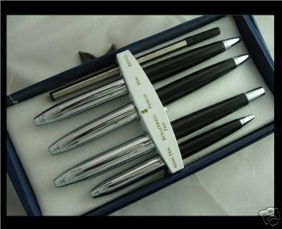 lot 48 image: Rare Vintage Bill Blass 4 Piece Pen & Pencil Set in black and silver