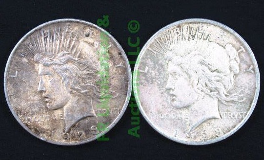 lot 77 image: Silver 1928 Peace dollars