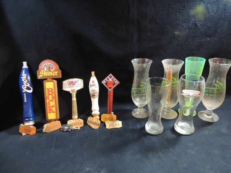 lot 203 image: Beer tap handles ( Coors, Shiner Bock, Miller, Red Dog, Bass) and 7 bottle decanter tags