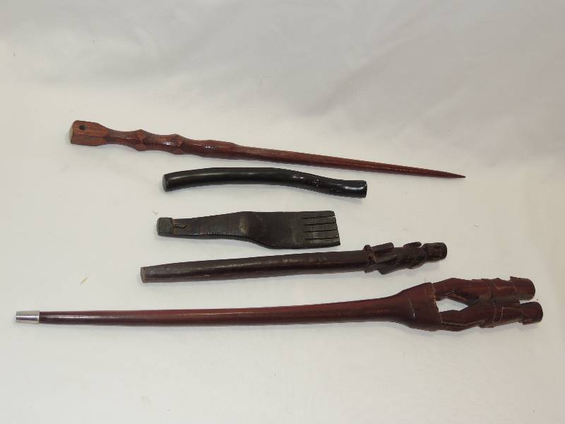 lot 179 image: Carved South American Pieces- Teak with 2 people 21 length, Dark wood totem style 21 total of 5 pieces