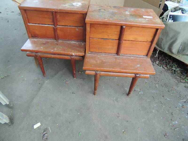 lot 580 image: 2 used night stands in need of TLC. 1 needs leg repair. Both are brown with 2 drawers. Could be a great DIY project.
