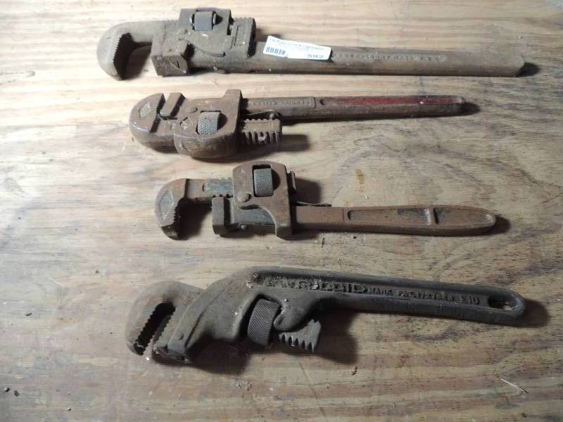 lot 592 image: 4 different size pipe wrenches INCL. RIDGID