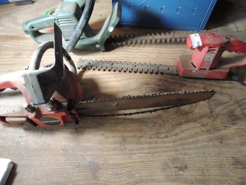 lot 597 image: 2 Bush trimmers,1 craftsman chainsaw (unknown working condition)