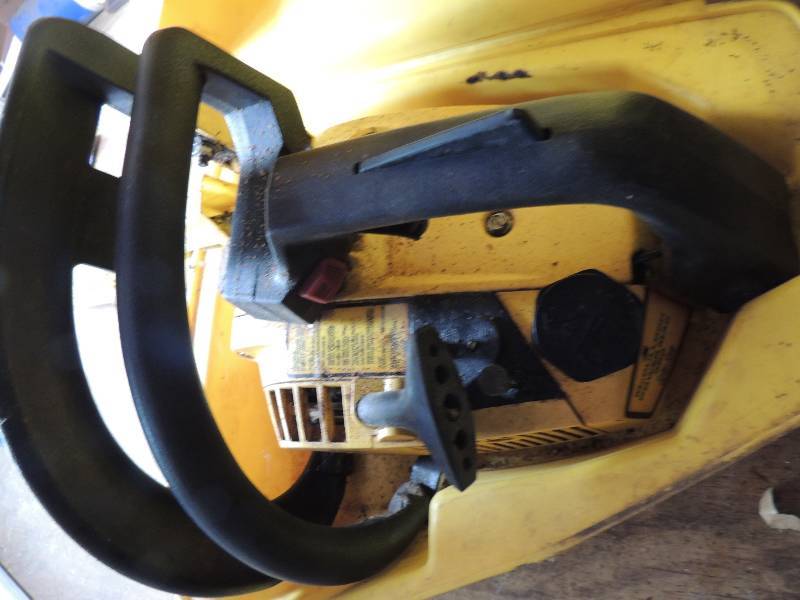 lot 601 image: McCullough Chain saw with yellow case