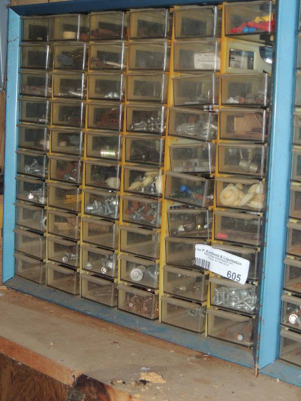 lot 605 image: Wall hanging drawer shelf with 60 sliding trays for nuts, bolts, screws and washer. Many more like items