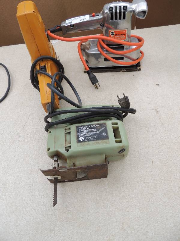 lot 618 image: Craftsman Multi purpose saw. Rockwell Jig saw, Power craft Polish sander and Black and decker Deluxe sander