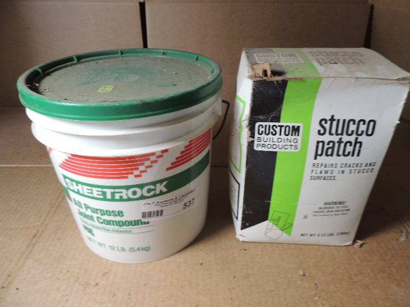 lot 537 image: New Sheet Rock joint compound and box of stucco patch