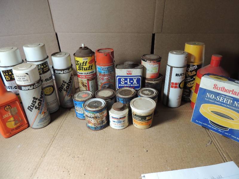 lot 539 image: 5 small cans of enamel, Toilet gasket, rust remover, foam sealant and more